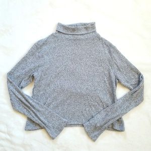 Gray turtleneck sweater. Size medium.
